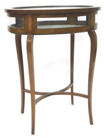 An Edwardian mahogany and marquetry oval display table