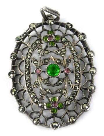 A Victorian style silver plated and marcasite set oval pendant