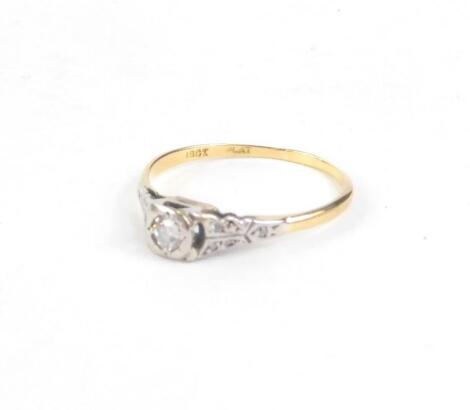 An 18ct gold and platinum diamond set dress ring