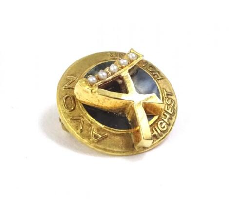 A 9ct gold Avon Highest Honour pin badge