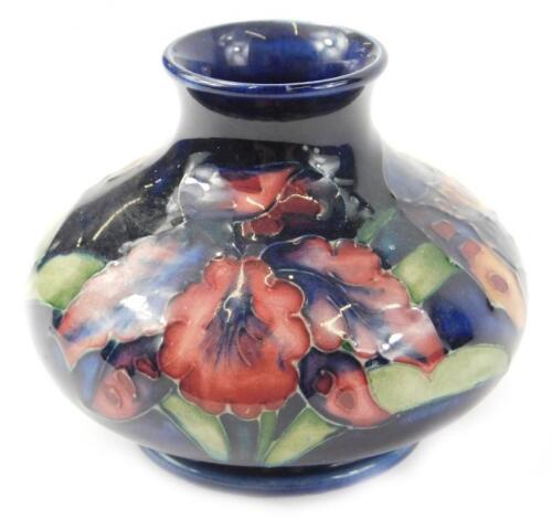 A Moorcroft floral decorated Fuscia pattern squat vase