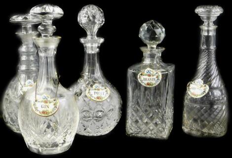 Five decanters and stoppers