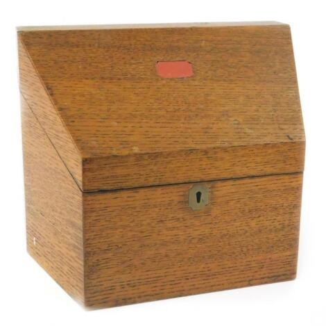 An early 20thC oak stationery box