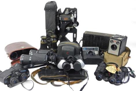 A collection of Tasco and various other pairs of binoculars