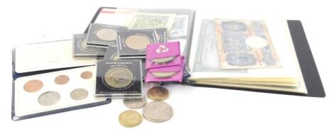 A collection of coins and bank notes