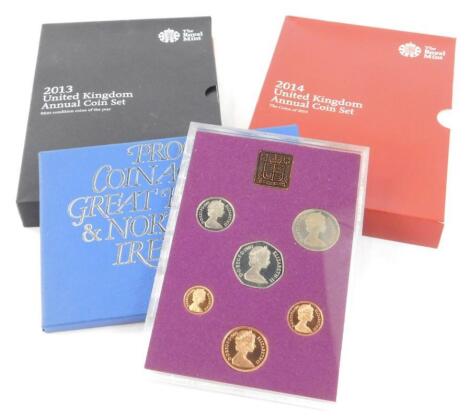 Four United Kingdom annual coin sets