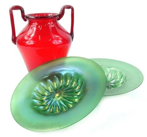 A large two handled Ruby tinted glass vase by Martinuzzi for Venini