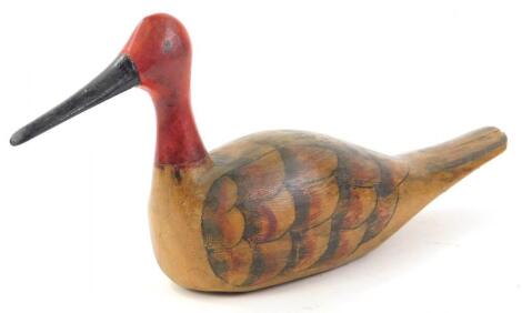 A carved wooden decoy type duck