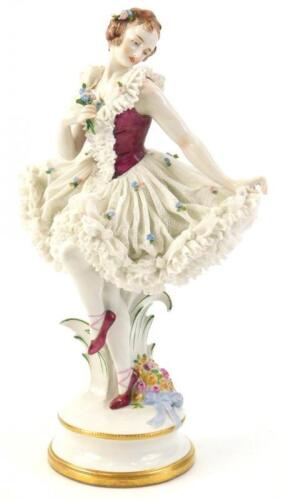A large Dresden porcelain crinoline ballet dancer