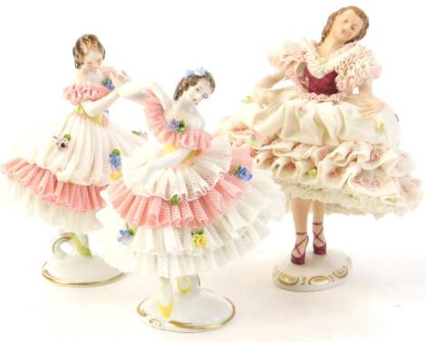 Three Dresden porcelain crinoline dancers