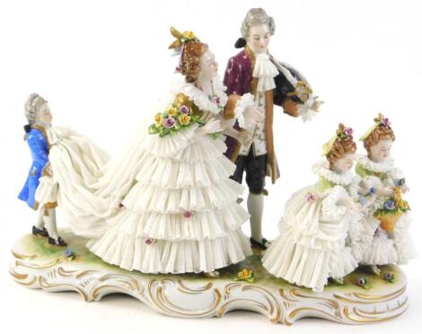 An unusual German porcelain crinoline wedding group