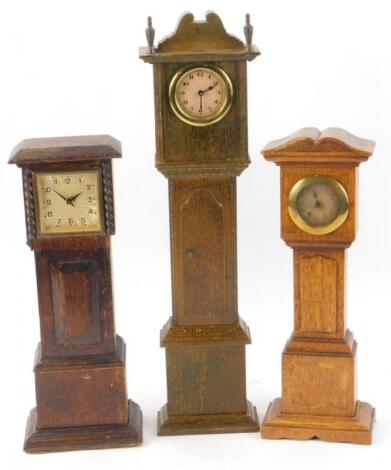 Three miniature longcase timepieces