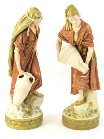 A pair of Royal Dux porcelain figures