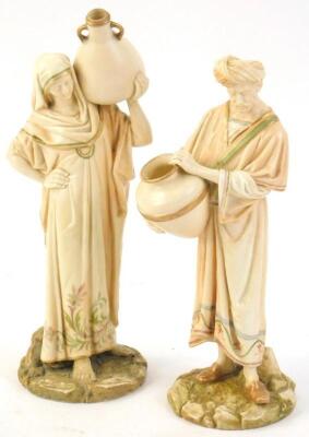 A pair of Royal Worcester Hadley style figures