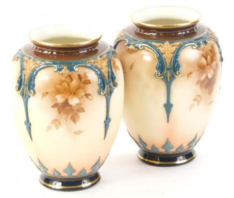 A pair of Hadleys Worcester vases