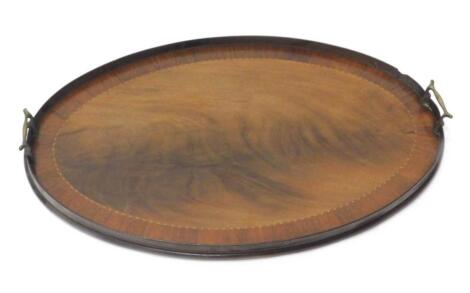 An Edwardian mahogany oval galleried tray