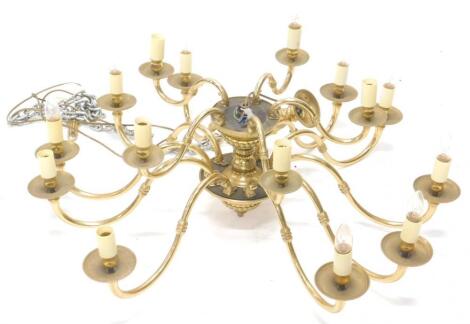 A fifteen branch brass chandelier