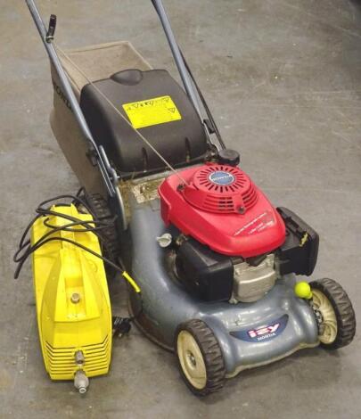 A Honda petrol I2Y lawn mower and a Karcher pressure washer