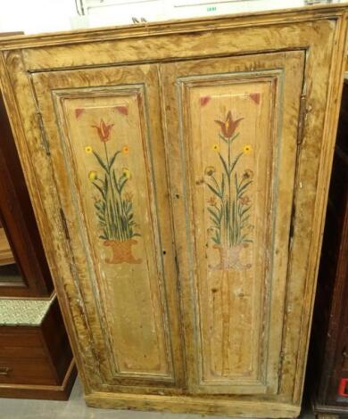 A Continental pine cupboard