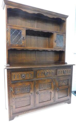 A Jaycee carved oak dresser