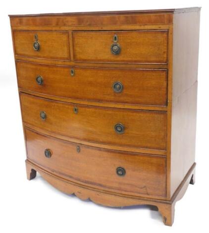 A Victorian oak and mahogany crossbanded bow fronted chest