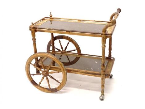 A continental hardwood and brass inlaid dinner wagon or trolley