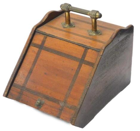 An Edwardian walnut coal scuttle