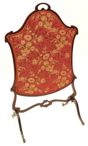 An Edwardian mahogany cartouche shaped firescreen