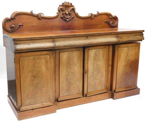 A Victorian figured mahogany breakfront sideboard