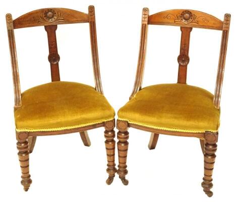 A pair of Victorian spoon back type chairs