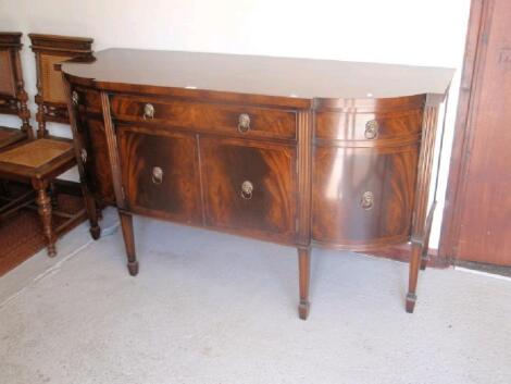 A reproduction Regency flamed mahogany sideboard by Rackstraw of Worcester