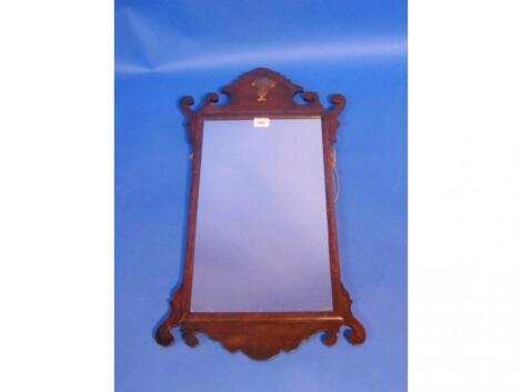 A mahogany and walnut pier glass in George II style