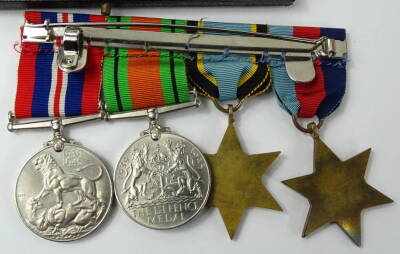 A World War Two Bomber Command distinguished flying cross (DFC) group of medals awarded to Squadron Leader Vernon Richard Smith of 144 Squadron, the lot to include the distinguished Flying Cross, 1939-45 Star, the Air Crew Europe Star, the Defence Medal, - 3