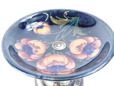 A Moorcroft pottery Big Poppy pattern comport or tazza, on a mottled navy blue ground, impressed mark to underside and silver plated pedestal and foot, 12cm H, 18.5cm diameter. - 2