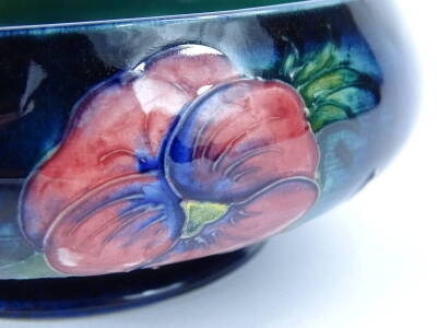 A William Moorcroft Pansy pattern shallow bowl, hand scripted mark and impressed potter to the Queen, 15cm diameter. - 2