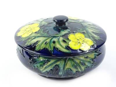 A Moorcroft Buttercup pattern covered bowl, designed by Sally Tuffin, with tube liner Alison Neal, paintress Sandra Eaton, 12cm diameter.