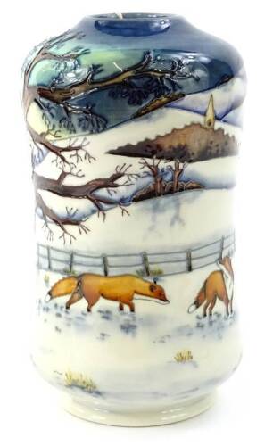 A Moorcroft Woodside Farm pattern vase, decorated with a winter landscape with foxes etc., signed to underside Anji Davenport, various other marks, dated 1.11.00, 19cm H.