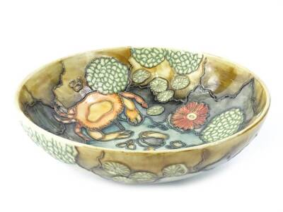 A Moorcroft Rockpool pattern bowl, designed by Wendy Mason, number 19/1000, with tube lining by Karen Gibson, the paintress Jennifer James, 26cm diameter.