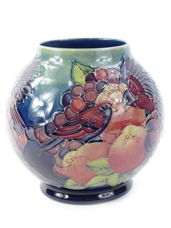 A Moorcroft Finch vase, designed by Sally Tuffin, with tube lining by Joyce Keeling and the paintress Angela Davenport, various marks to underside, 17cm H.