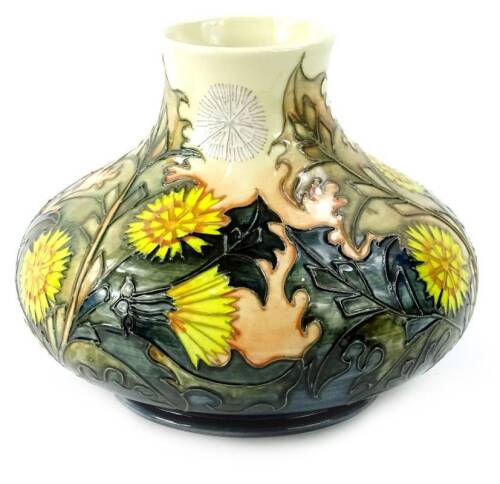 A Moorcroft Dandelion pattern limited edition vase, designed by Sally Tuffin, number 180/200, commissioned by Neville Pundole, with tube lining by Shirley Lownes, the paintress Beverley Wilkes, 19cm diameter.