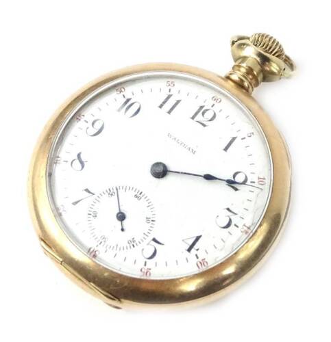 A Waltham pocket watch, with white enamel dial, seconds dial, blue hands, bezel wind with Waltham Mass, A.W.W and Co movement marked 9800864, the inner cover marked 14ct gold filled, the outer case yellow metal, unmarked, bearing floral letters to rear, 1