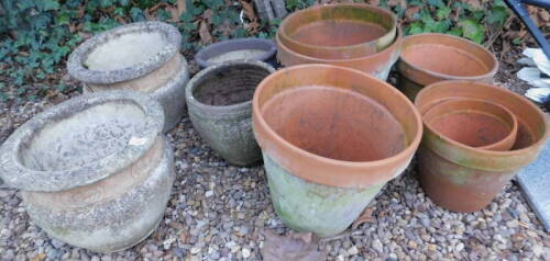 A collection of garden pots, planters, etc., to include some composition and some terracotta.