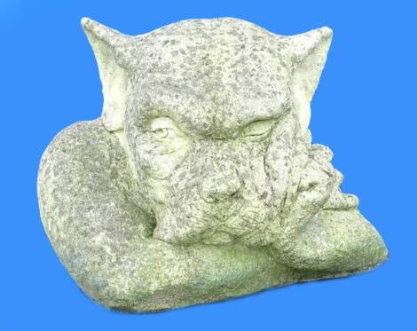 A composition garden gargoyle type statue, 42cm W.