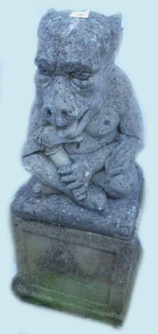 A composition gargoyle type garden ornament, on a square base, with plinth, 88cm H overall.