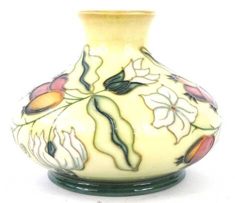 A Moorcroft White Holly pattern vase, decorated with flowers and berries on a cream ground, designed by Nicola Stanley, tube-lined by Sarah Pendlebury, paintress Hayley Mitchell, no.5 in an edition for the Open Weekend 1999, handwritten and impressed mark