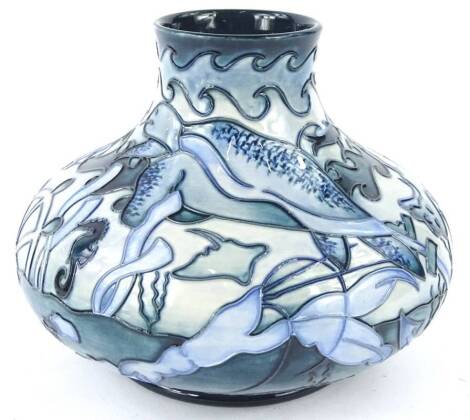 A Moorcroft Turtle pattern trial squat vase, decorated with seahorses, turtles, anchor etc. on a mottled blue ground, designed by Jeanne McDougall, tube-lined by Caroline Hume, paintress Hayley Moore, signed and dated 28.11.99, marked trial 13.1.99 and im
