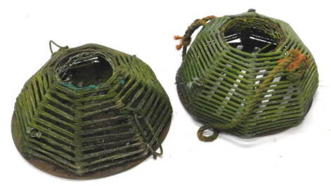 A pair of iron lobster or crab pots, with woven rope around the metal frame, 48cm W.