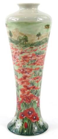 A Cobridge stoneware vase, decorated with field of poppies etc., decorators and other initials for Sam Johnson and Jackie Strode, limited edition number 18/75, impressed marks, 25cm H.