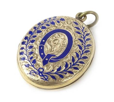 A Victorian locket, with floral etched design, raised front with leaf scroll, blue enamel borders, and central Q motif, inscribed to back MAW, with locket centre, yellow metal unmarked, 3.5cm H x 2.5cm W.