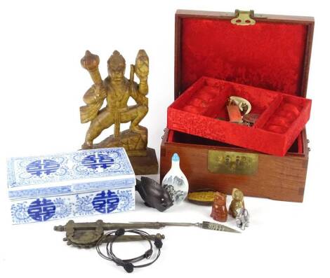 A collection of oriental items, to include a Chinese rectangular blue and white box and cover, snuff bottles, a brass cutter, an agate cat, a carving of Hanuman, a hardwood jewellery box containing Eastern silver coloured metal medallion etc.